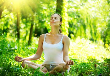 Doing Yoga Exercises Outdoor