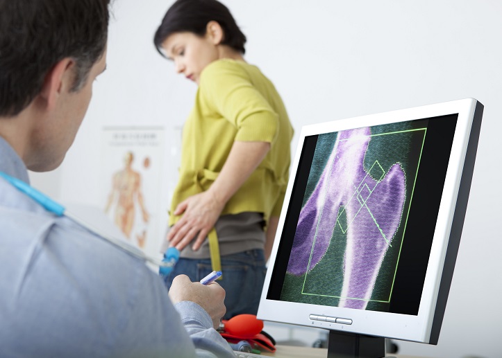 Doctor scanning bones for breaks