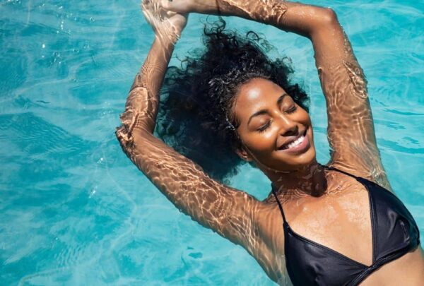 Woman relaxing in the pool.