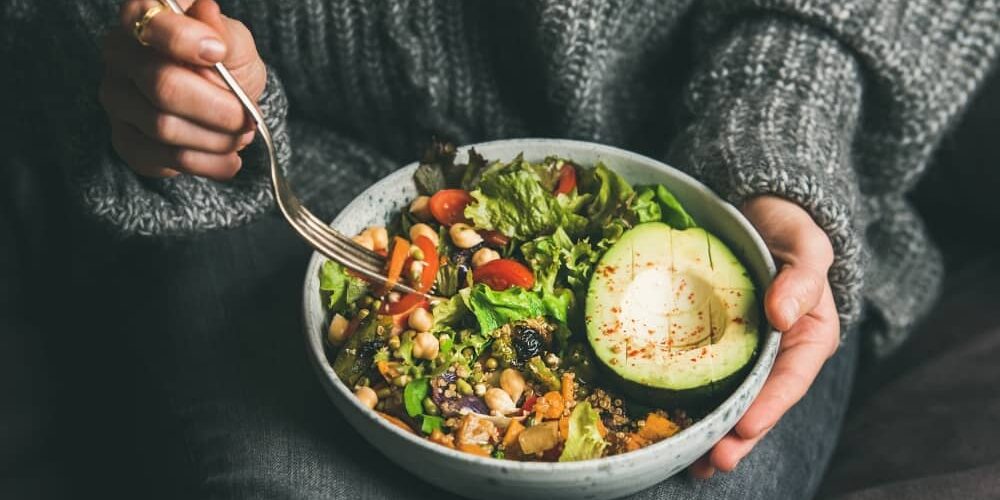 woman-eating-healthy The easiest way to decrease your calories and increase your nutrition intake is by choosing more nutrient-dense foods.
